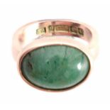 A 9ct .375 hallmarked YELLOW GOLD DRESS RING with large oval cushion shaped jade stone inset