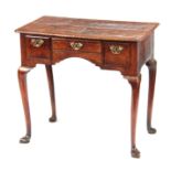 AN ELEGANT GEORGE II WALNUT LOWBOY HAVING GOOD COLOUR AND PATINA with quarter veneered top and inset