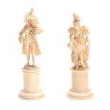 A FINE PAIR OF 19TH CENTURY EUROPEAN CARVED IVORY FIGURES depicting a Lady and a Gentleman in fine