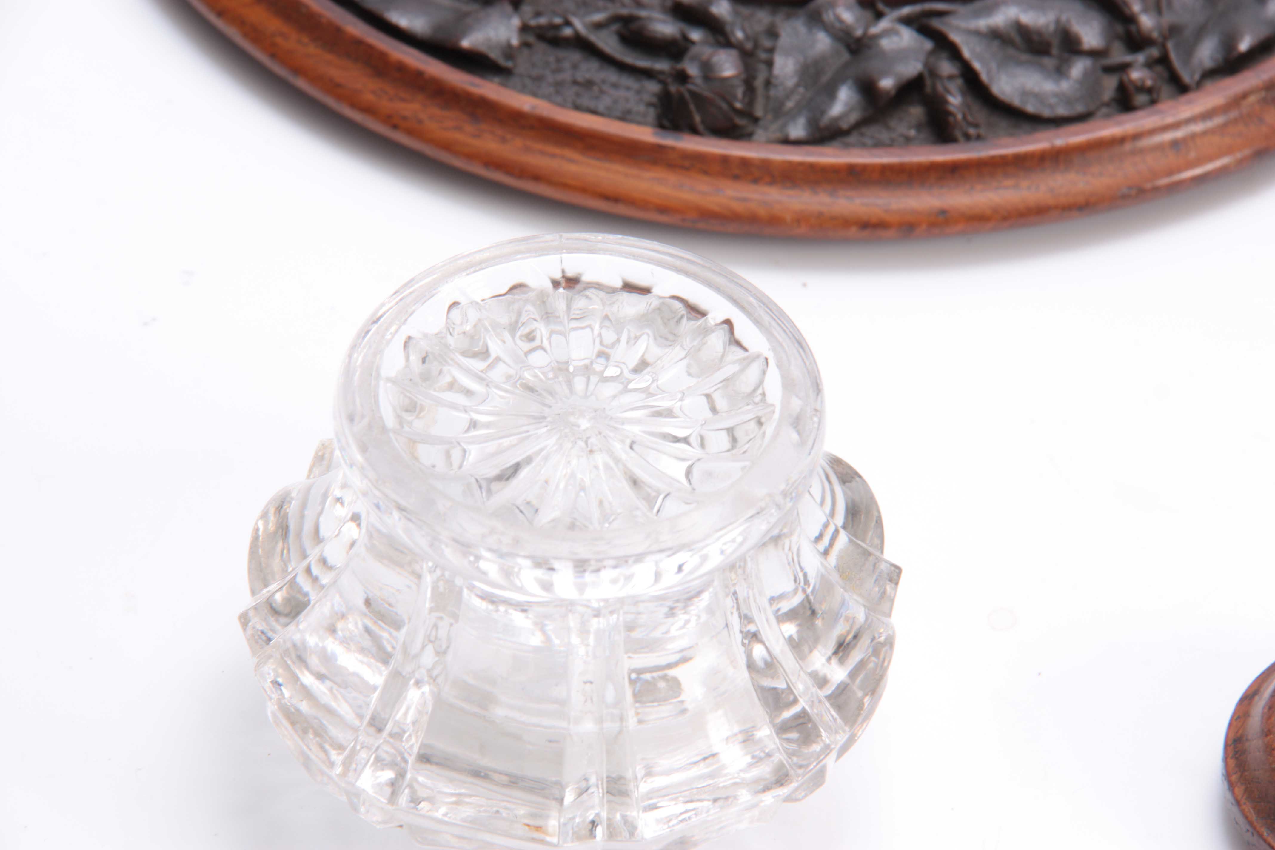 A 19TH CENTURY CARVED OAK CIRCULAR INK STAND with cut glass inkwell to the centre having a floral - Image 4 of 5