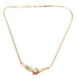 A STYLISH 18CT YELLOW GOLD NECKLACE with diamond set curved front piece