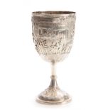 A LARGE INDIAN SILVER GOBLET with gilt interior and embossed decoration with Indian god sat on a