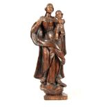 AN IMPRESSIVE 18TH CENTURY ITALIAN BAROQUE CARVED LIMEWOOD FIGURE OF MADONNA WITH CHILD 102cm high.