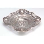 A DECORATIVE LATE 19TH CENTURY 800 HALLMARKED SILVER PIERCED SCALLOP EDGE SQUARE DISH with ornate