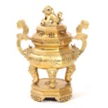 A LARGE CHINESE CAST BRASS OCTAGONAL LIDDED CENSER ON STAND with Foo Dog finial and dragonhead