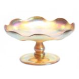 A TIFFANY, FAVRILE IRIDESCENT GLASS FOOTED COMPOTE with baluster stem, plain folded foot and moulded