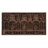 A LATE 19TH CENTURY INDIAN WALL PANEL finely carved with figures amongst temples 198cm wide 100cm
