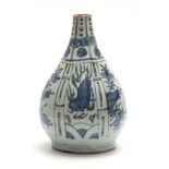 A CHINESE BLUE AND WHITE MING VASE decorated with horses and floral sprays 25cm high (A.F.).