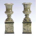 AN UNUSUAL PAIR OF HEAVILY STRIATED LIGHT GREEN URN SHAPED MARBLE VASES/CANDLEHOLDERS on square