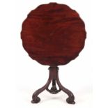 A FINE GEORGE III FIGURED MAHOGANY CHIPPENDALE STYLE TILT TOP TABLE with solid shaped edge hinged