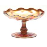 A TIFFANY, FAVRILE IRIDESCENT GLASS FOOTED COMPOTE with baluster stem, panelled foot and bowl with