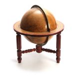 A MID 19TH CENTURY MALBYS TERRESTRIAL TABLE GLOBE the 12" orb mounted in a mahogany stand with