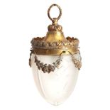 AN EARLY 20TH CENTURY GILT CAST BRASS HANGING HALL LANTERN of inverted acorn shape with cut and