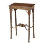 A LATE GEORGIAN LACQUERED JARDINIERE TABLE decorated with painted floral work; standing on chamfered