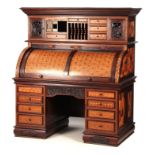 AN IMPRESSIVE MEIJI PERIOD JAPANESE INLAID ROLLTOP DESK finely inlaid with various exotic woods