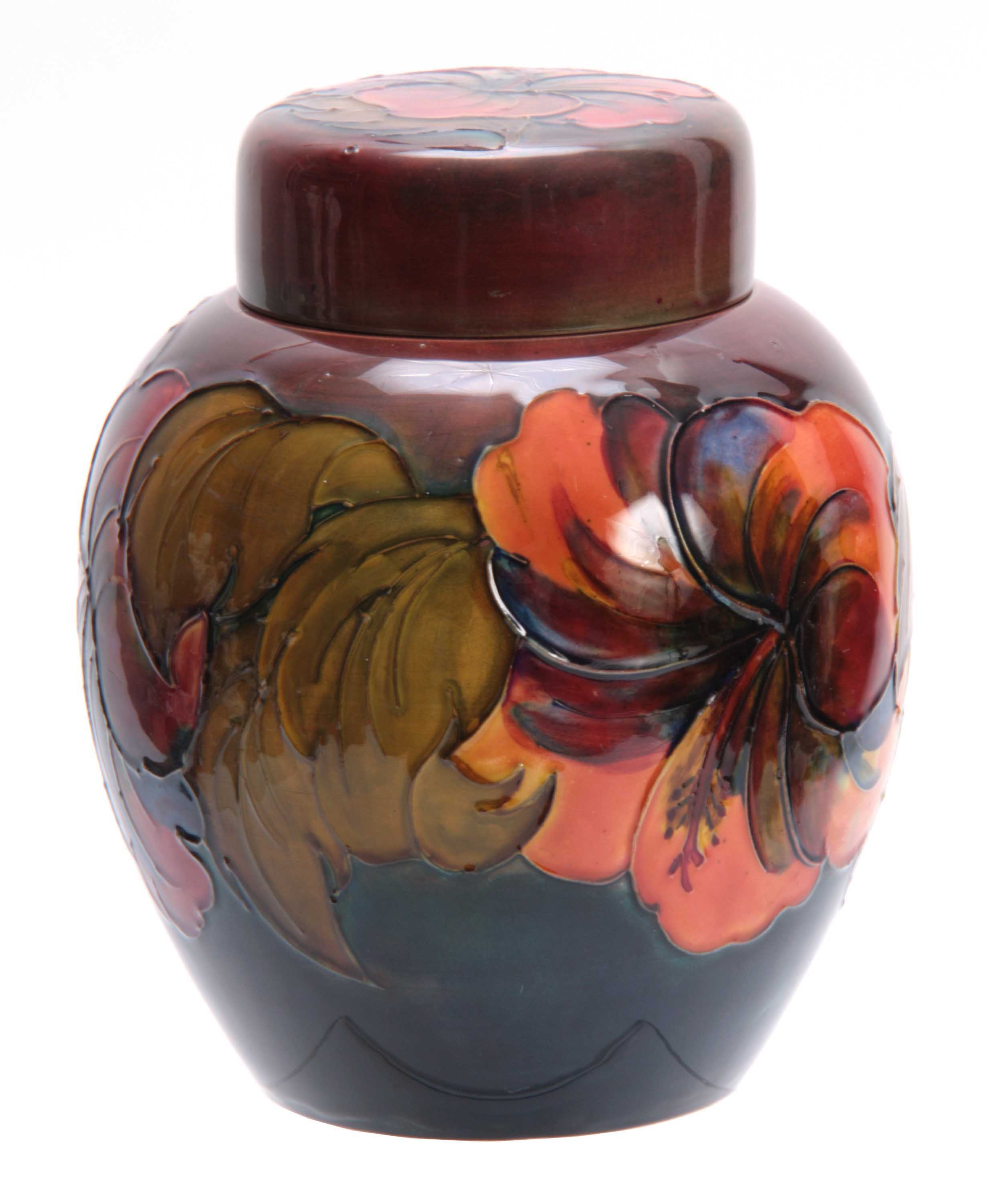A WALTER MOORCROFT LARGE BULBOUS GINGER JAR AND COVER with colourful tube lined decoration of