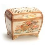 AN OVERSIZED MEIJI PERIOD JAPANESE SATSUMA POTPOURRI JARDINIERE AND COVER decorated with pheasant