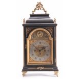 A MID 18TH CENTURY AUSTRIAN QUARTER CHIMING VERGE BRACKET CLOCK the ebonised case with inverted bell