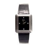 A PIAGET 18CT WHITE GOLD WRISTLET WATCH of rectangular form with stepped case, black dial and