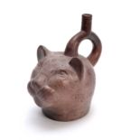 A 20TH CENTURY COLIN BEEN POTTERY JUG MODELLED AS A LEOPARDS HEAD 20cm wide 19cm high.