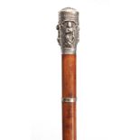 A LATE 19TH CENTURY ANGLO INDIAN GENTLEMANS MALACCA SWORD STICK WITH ORNATE EMBOSSED SILVER POMMEL