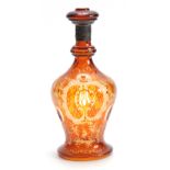 A LATE 19THCENTURY BOHEMIAN SILVER MOUNTED AMBER DECANTER AND STOPPER the clear oval panelled