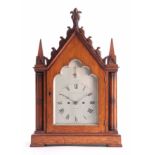 LE PLASTRIER & YOUNG, LONDON. A MID 19th CENTURY GOTHIC OAK BRACKET CLOCK the architectural oak case