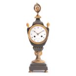 THIERRY á PARIS. AN EARLY 18th CENTURY FRENCH BRONZE AND ORMOLU MANTEL CLOCK the urn-shaped case
