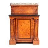 A REGENCY BURR ELM LIBRARY CABINET IN THE MANNER OF GEORGE BULLOCK with a raised superstructure
