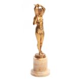 THE WATER CARRIER BY JOE DESCOMPS. A FRENCH ART DECO GILT BRONZE SCULPTURE modelled as a nude lady