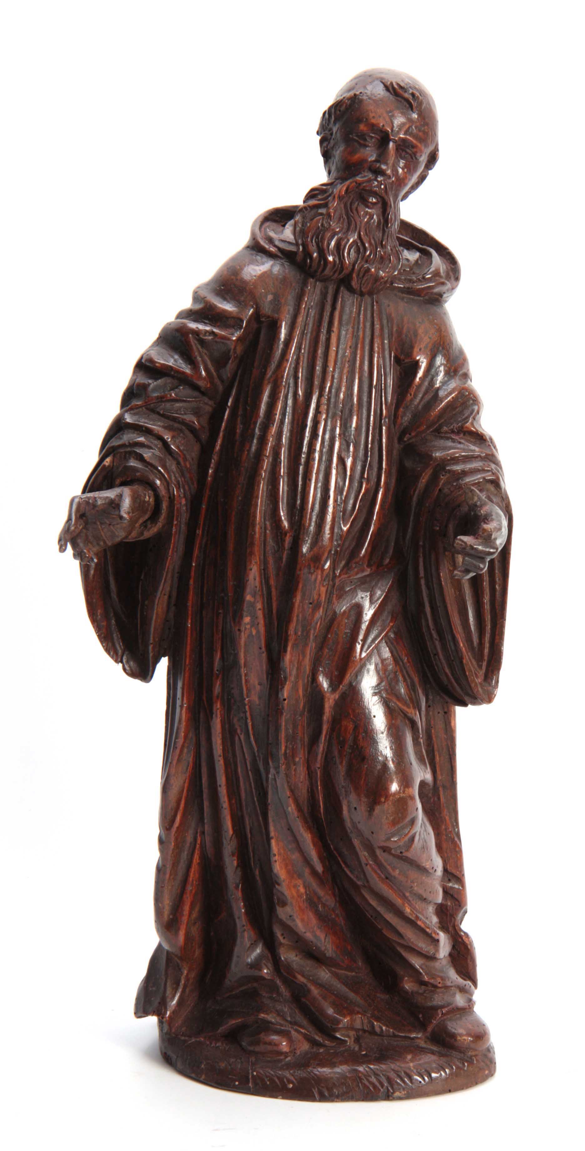 A 17TH CENTURY CARVED LIMEWOOD FIGURE OF A SAINT finely carved with a good patination 48cm high.