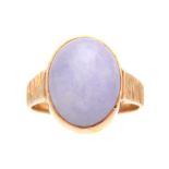 AN 18CT YELLOW GOLD RING set with a semi-precious pale mauve cabochon shaped stone