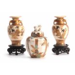 A PAIR OF SATSUMA GILT AND CREAM GROUND TWO HANDLED SMALL SHOULDERED VASES with figural panelled
