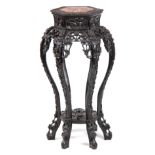 A HARDWOOD CHINESE PLANT STAND WITH MARBLE INSET TOP, 81cm high, 47cm wide.