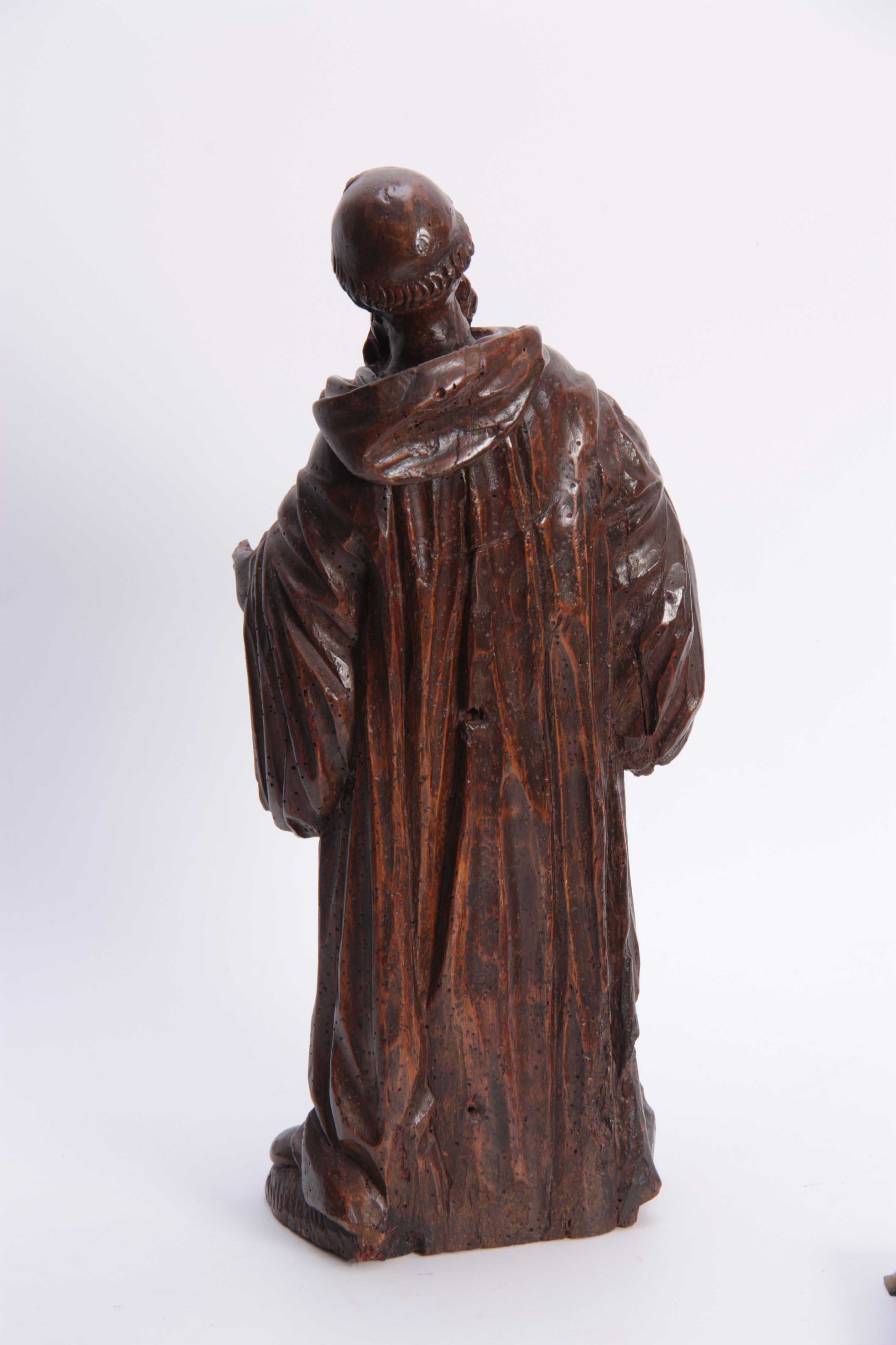 A 17TH CENTURY CARVED LIMEWOOD FIGURE OF A SAINT finely carved with a good patination 48cm high. - Image 5 of 5