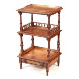LAMB, MANCHESTER A LATE 19TH CENTURY ARTS AND CRAFTS OAK THREE TIER WHATNOT with ebonised turned
