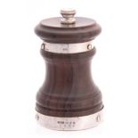 A LATE 19TH CENTURY TURNED WOOD AND SILVER MOUNTED PEPPER MILL - Birmingham 1885 9cm high.