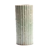 A CHINESE CYLINDRICAL CELEDON VASE decorated with bamboo shoots - signed with impressed seal mark