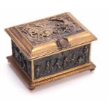 A LATE 19TH CENTURY CONTINENTAL GILT BRASS JEWELLERY CASKET set with cast bronzed figural panels