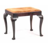 A GEORGE III MAHOGANY STOOL with drop-in seat and caddy edged rails; standing on cabriole legs