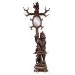 AN IMPRESSIVE LATE 19TH CENTURY SWISS BLACK FOREST STICK AND COAT STAND depicting a large bear