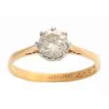 A YELLOW GOLD AND PLATINUM CLAW SET SOLITAIRE DIAMOND RING approx 1ct