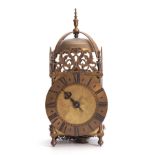 A MID 20th CENTURY LANTERN CLOCK the brass case of typical design having a 6.5" engraved dial with