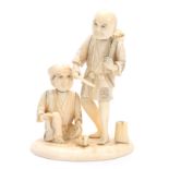 A MEIJI PERIOD JAPANESE IVORY OKIMONO modelled as two farmers with a basket of vegetables on oval