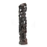 AN AFRICAN CARVED HARDWOOD FIGURAL STATUE 61cm high.