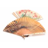 TWO LATE 19TH CENTURY JAPANESE SHIBAYANA IVORY HANDLED FANS set with different raised insects to the