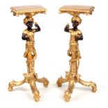 A PAIR OF 19TH CENTURY STYLE REPRODUCTION GILT GESSO JARDINIERE STANDS with Blackamoor figural stems
