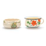 TWO PIECES OF 1930'S CLARICE CLIFF POTTERY comprising a fantasque chamber pot decorated with