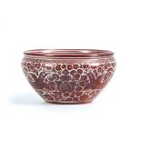 A 20TH CENTURY CANTEGALI RUBY LUSTRE BOWL decorated with birds, bearing painted cockerel mark 11cm