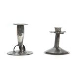 TWO ARTS AND CRAFTS PEWTER CANDLESTICKS the taller bullet-shaped Liberty style candlestick having